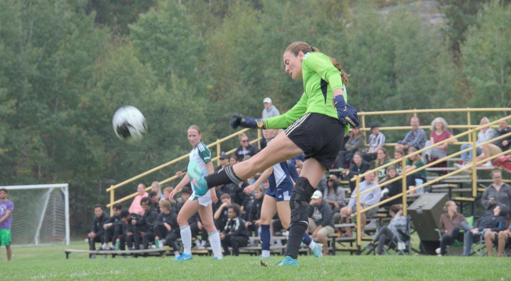 Hunter Jones clears the ball - Mark Wilson