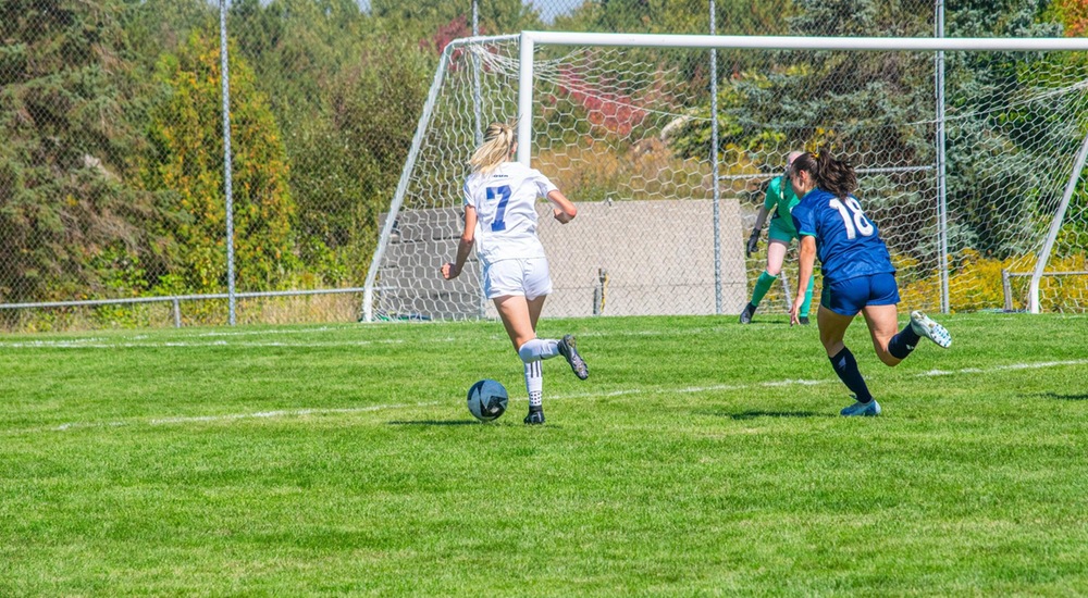 Mary Whiffen advances the ball - Mark Wilson